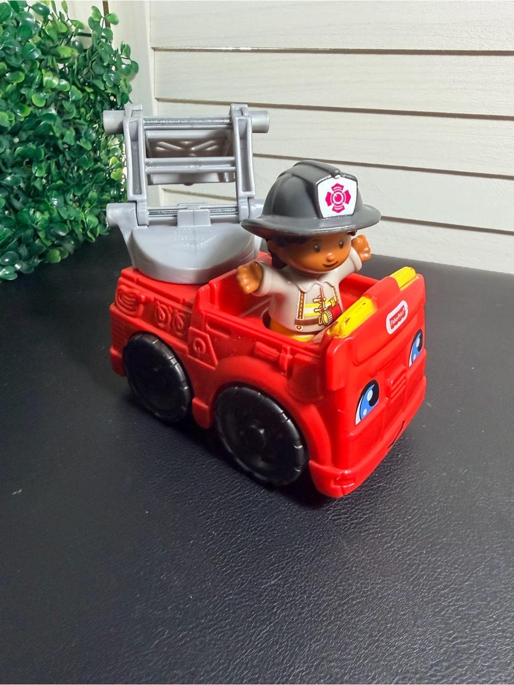 Fisher-Price Little People Red Fire Rescue Truck with Black-Helmet Firefighter